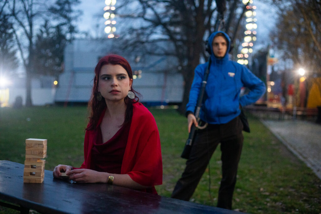 Actress on a Prague Film School set — sound guy in the background